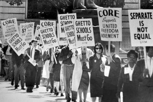 A line of United Freedom Movement (UFM) picketers on the East 6th Street side of the Cleveland Board of Education Building to protest de facto segregation in the Cleveland Public Schools system