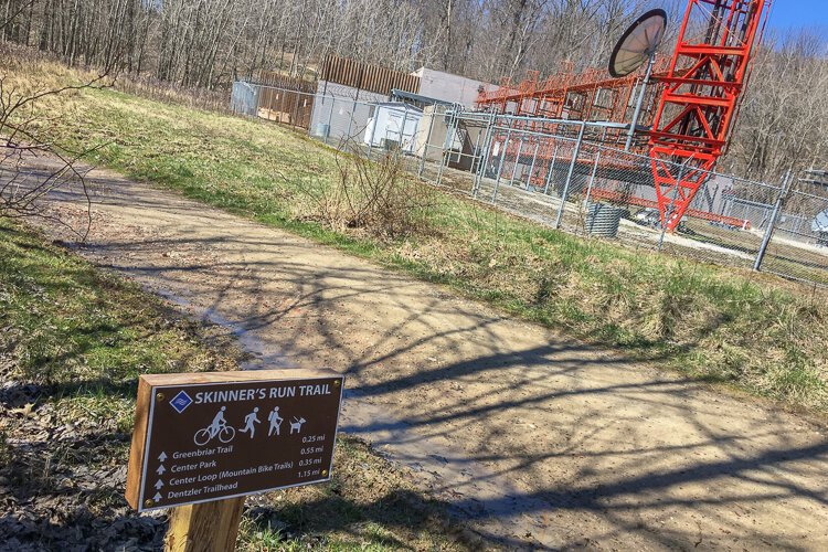 The business end of the radio transmission tower sits adjacent to Skinner's Run Trail.