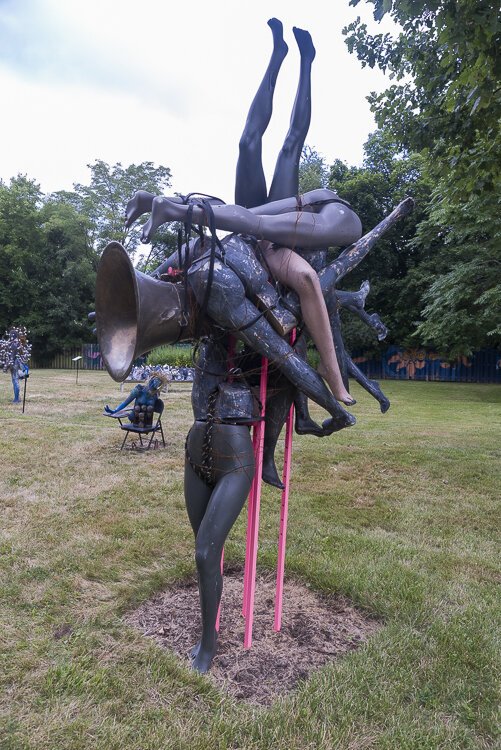 In Quincy Garden artist Abigail DeVille created an outdoor installation of semi-figurative and abstract sculptures that references the tradition of African American yard art.