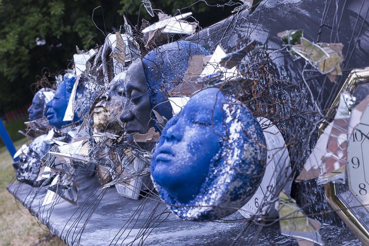 In Quincy Garden artist Abigail DeVille created an outdoor installation of semi-figurative and abstract sculptures that references the tradition of African American yard art.