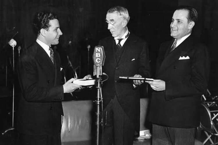 George A. Martin, President Sherwin-Williams Co., center at an award ceremony in 1938	