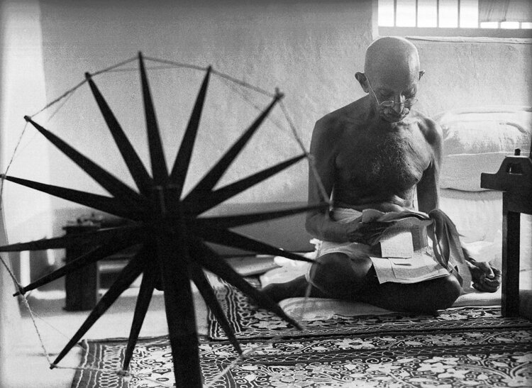 1946 portrait of Gandhi and His Spinning Wheel