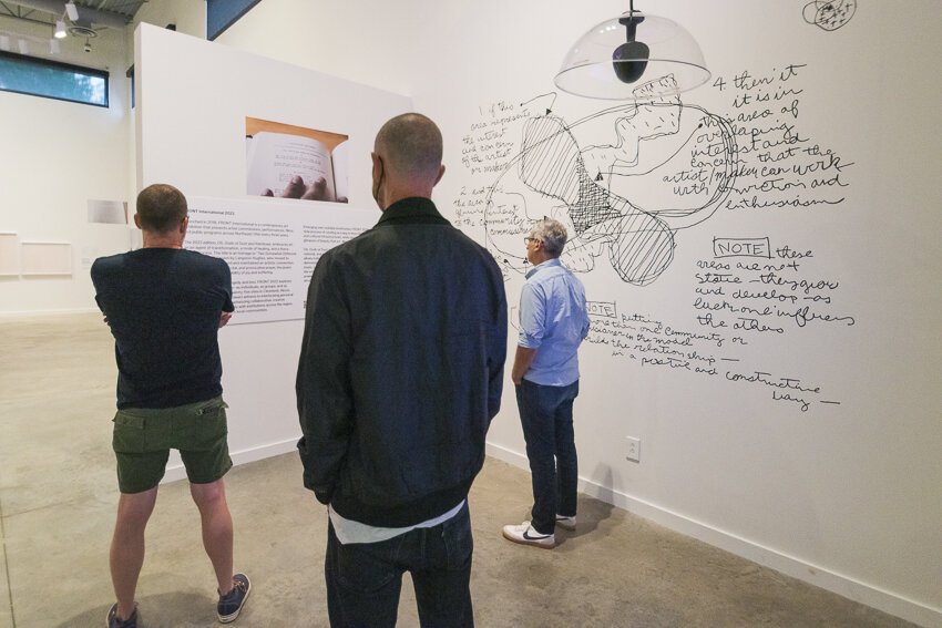 FRONT PNC Exhibition Hub at Transformer Station features an intergenerational group show by artists Sarah Oppenheimer and Tony Cokes that blends their distinct approaches to interactive architecture and moving images.