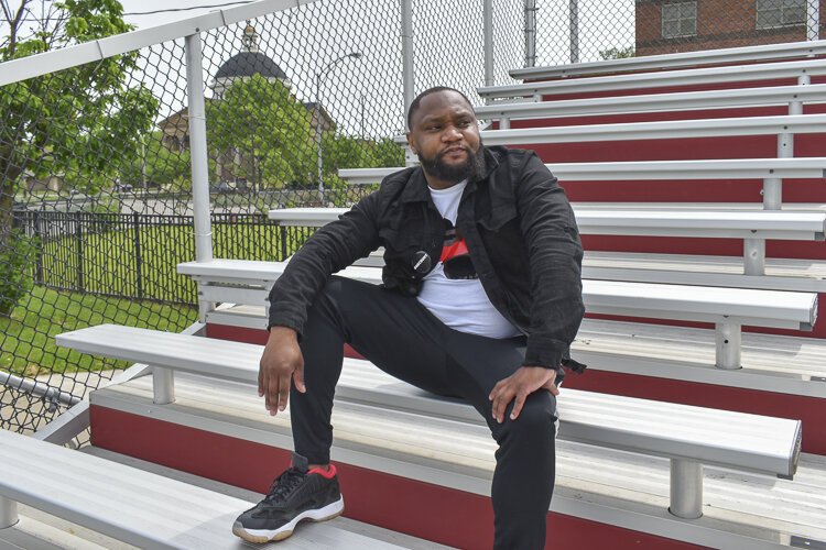 Walter Patton, a local activist and lifelong Central resident, sits in the bleachers of Dwayne Browder Field in Central Avenue as he discusses the challenges the neighborhood faces, and the specific aid it needs. Browder was Patton's mentor.