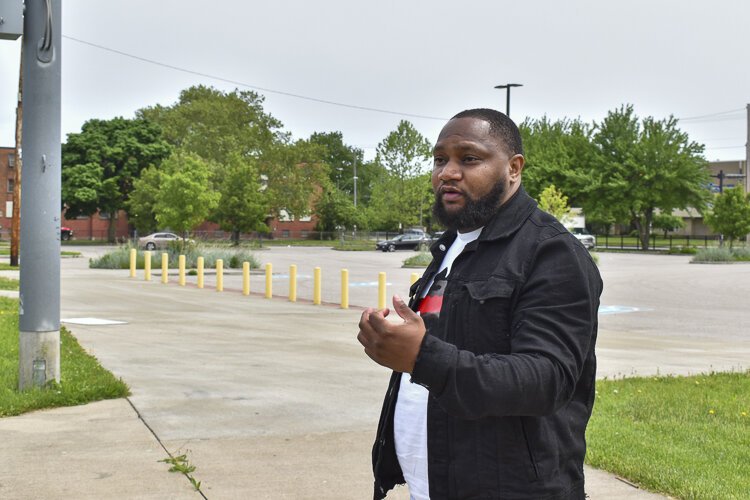 Walter Patton, a local activist and lifelong Central resident, stands outside Dwayne Browder Field in Central Avenue as he discusses the challenges the neighborhood faces, and the specific help it needs. Browder was a mentor of his.