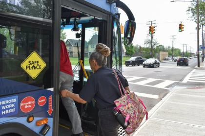 Marvetta Rutherford, a spokesperson for the advocacy group Clevelanders for Public Transit, boards the #15 bus to get to her temp job. 