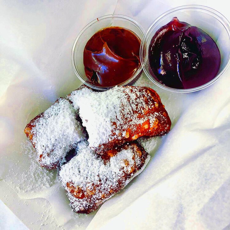 Cronuts are fried croissant dough pillows dusted with sugar.
