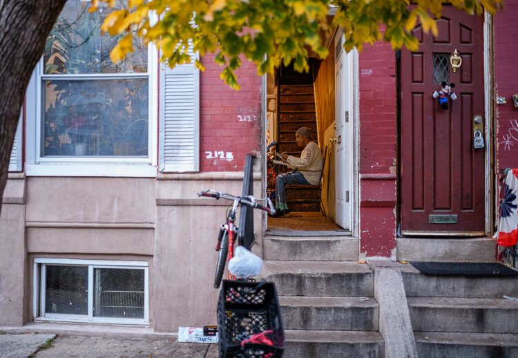 Marguerite Penn goes over her past water bills that ballooned to over $6000 at her home in Philadelphia.