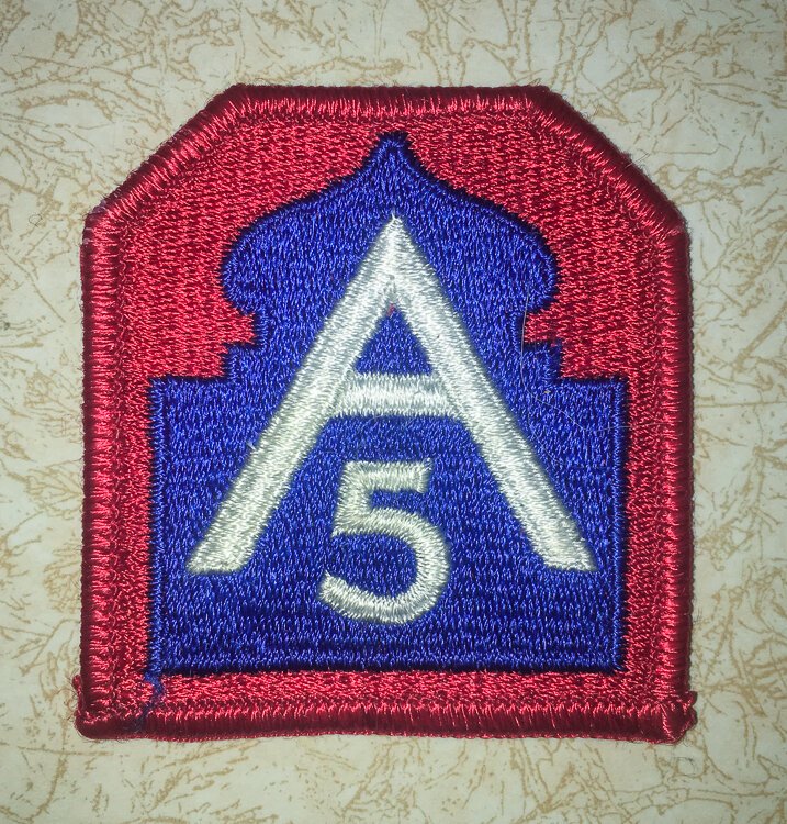 5th Army shoulder patch designed in Morocco early in 1943. The blue segment mimics the shape of towers or domes seen on buildings in the area. 