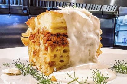 Astoria’s Pastitsio: Layered Penne Pasta with Seasoned Beef. Topped with Béchamel
