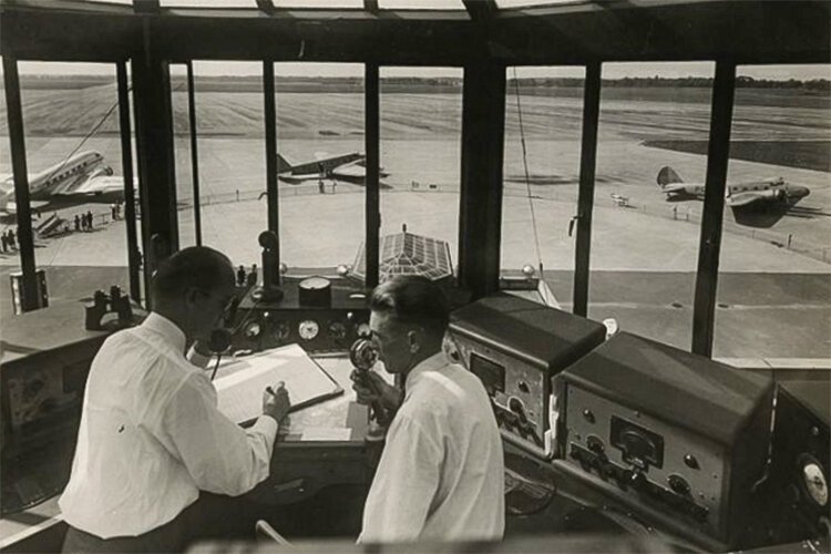Two 1930s radio control men at work in the Cleveland Municipal Airport
