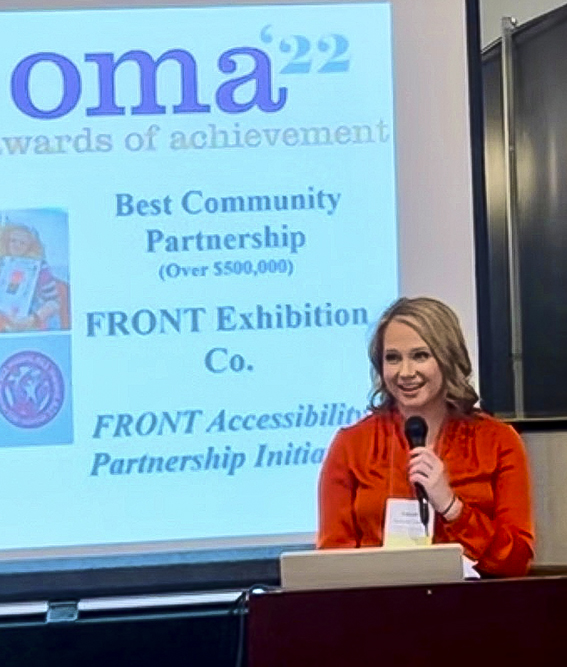 FRONT Deputy Director Sarah Spinner Liska accepting the OMA Community Partnership Award