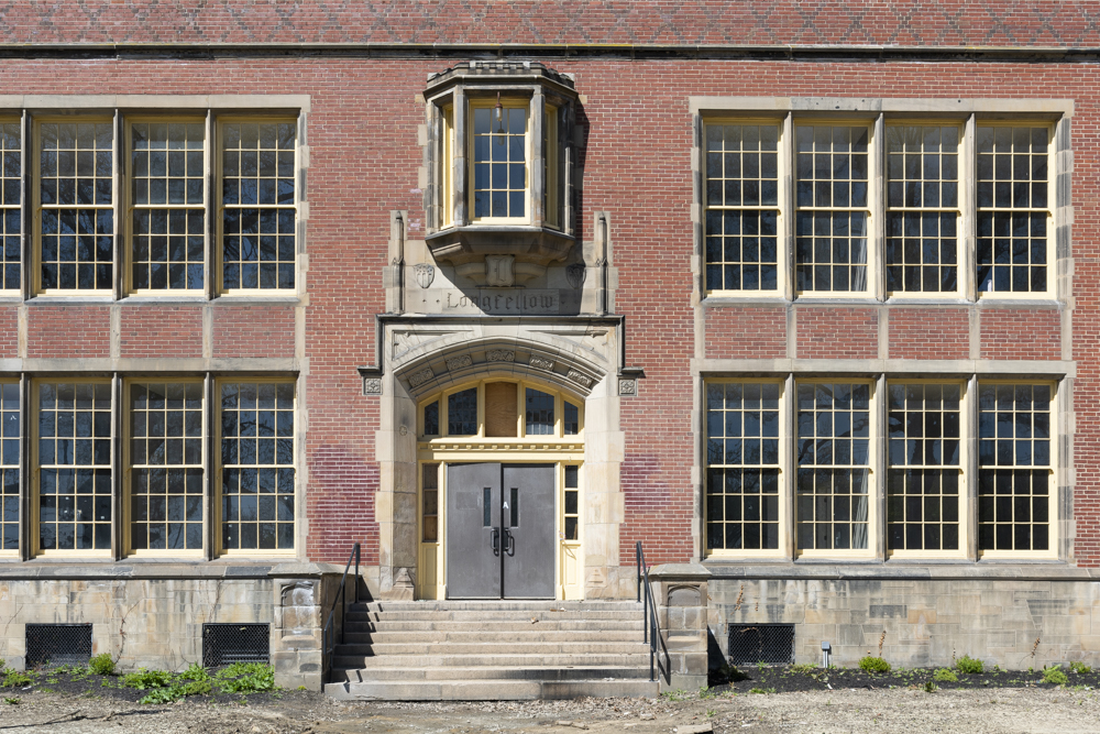 Exterior of The Longfellow apartments, the former Longfellow Elementary School