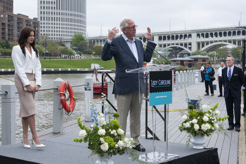 Jeffrey P. Jacobs' with daughter, Caroline, speaks at the christening
