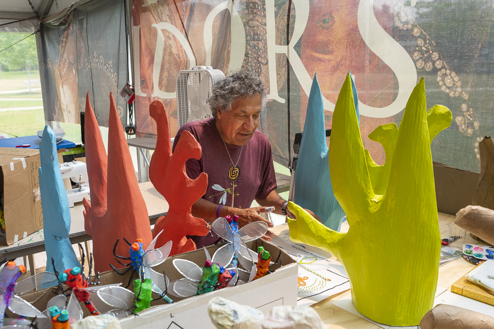 Héctor Castellanos Lara, Lead Artist, Parade the Circle working in the artist tent