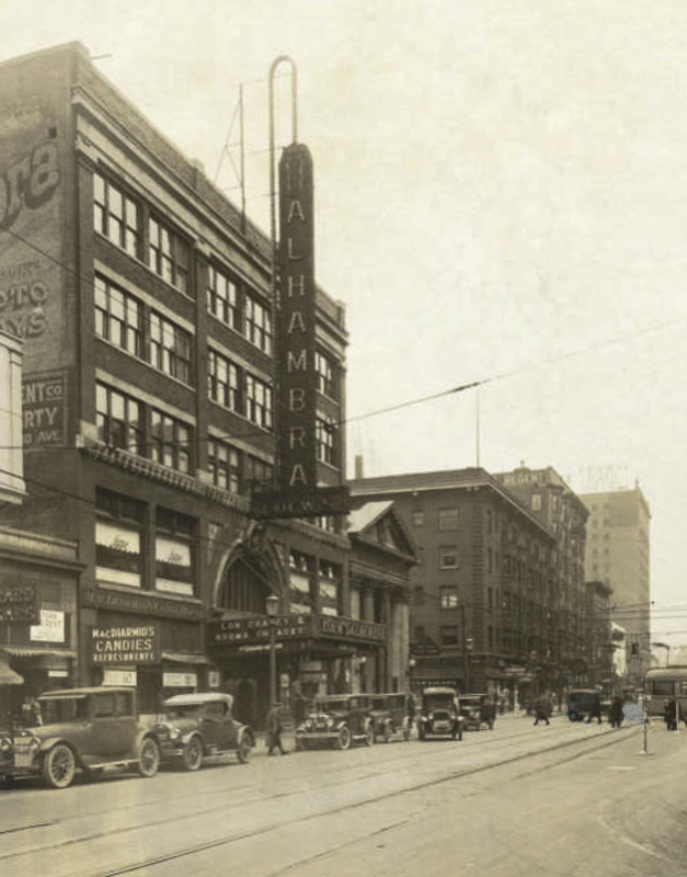 North side of Euclid Ave at E105th St, showing Loew's Alhambra Theater, in 1928
