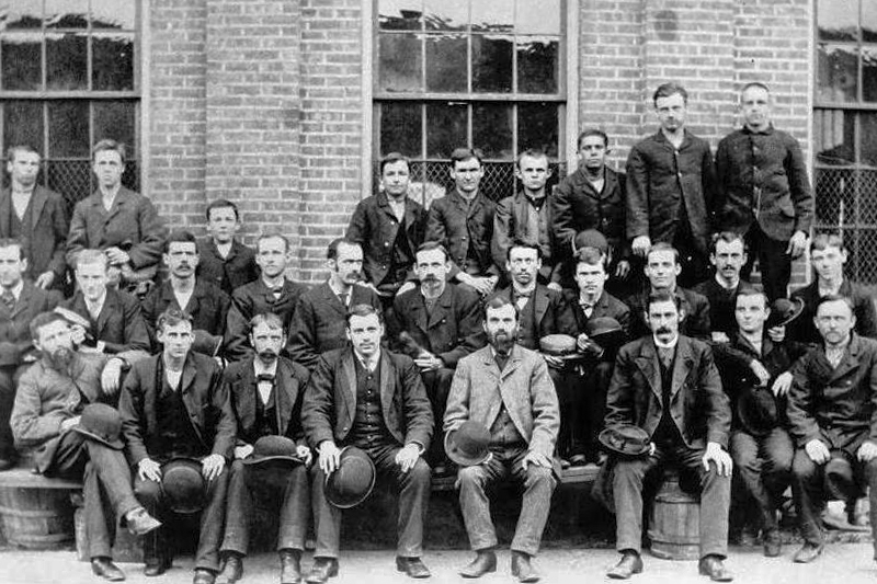 A group of Warner & Swasey workers pose for an employee group picture in 1883