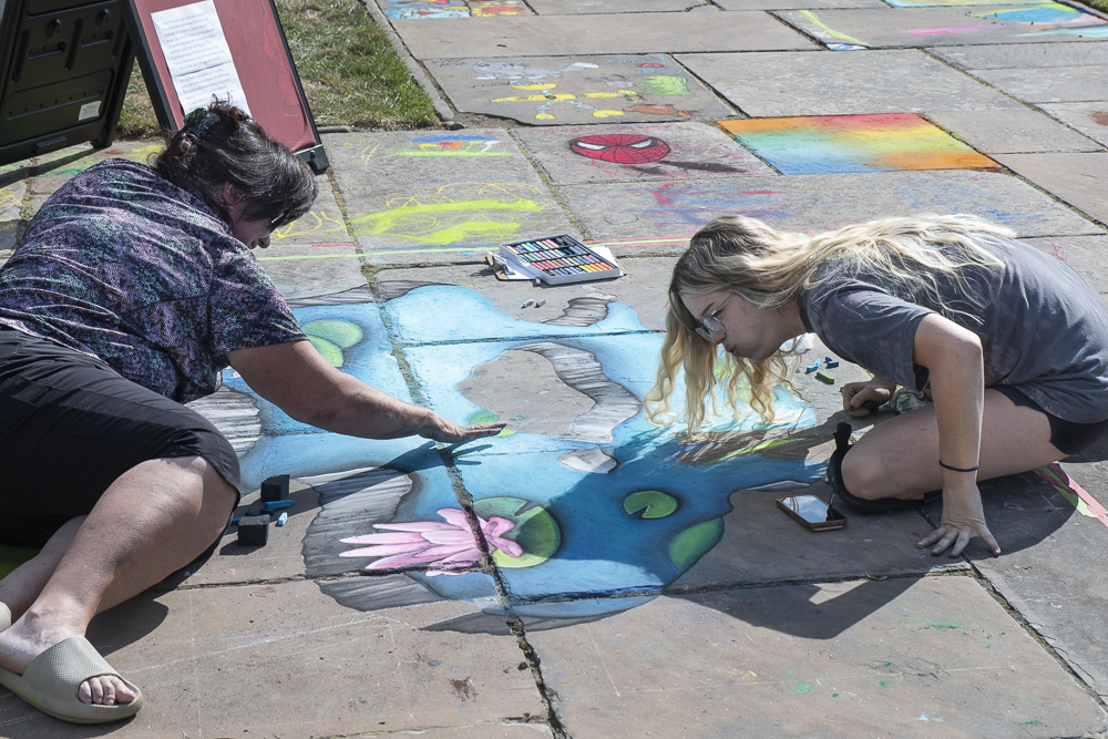 Chalk Fest featured artist Lauren Zawie (right)