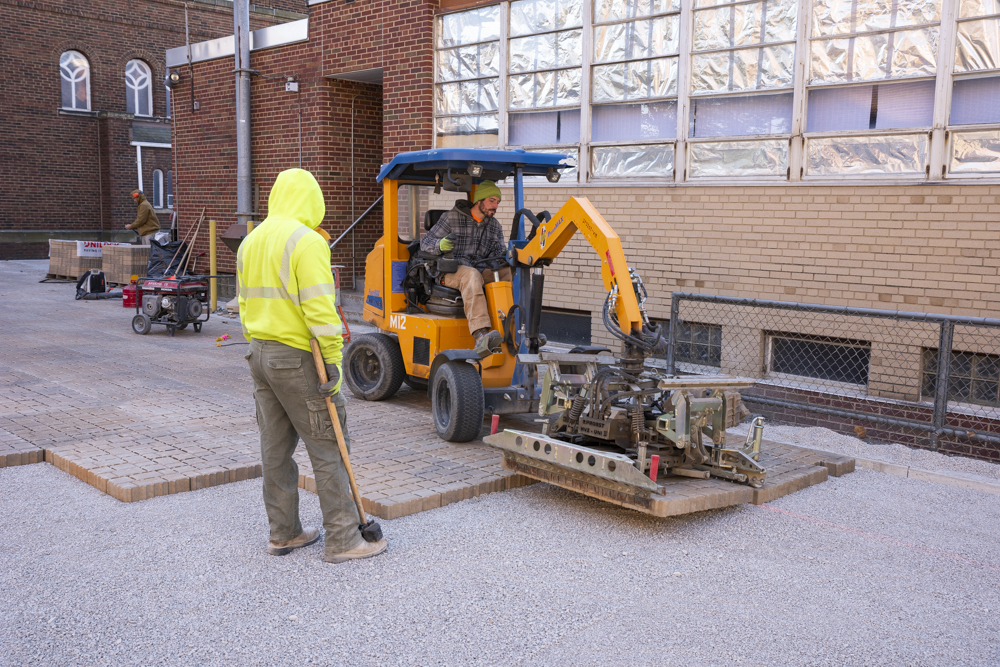 Permeable pavers in a parking being laid down at St. Casimir Church