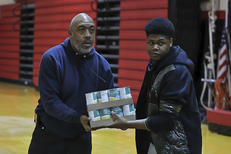 Omega Psi Phi Fraternity annual Christmas Food Basket Giveaway