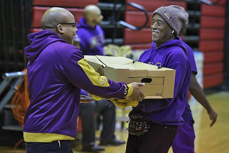 Omega Psi Phi Fraternity annual Christmas Food Basket Giveaway