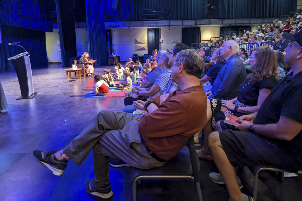 Senator Sherrod Brown watches as his author wife Connie Schultz reads
her first children's book to a large crowd