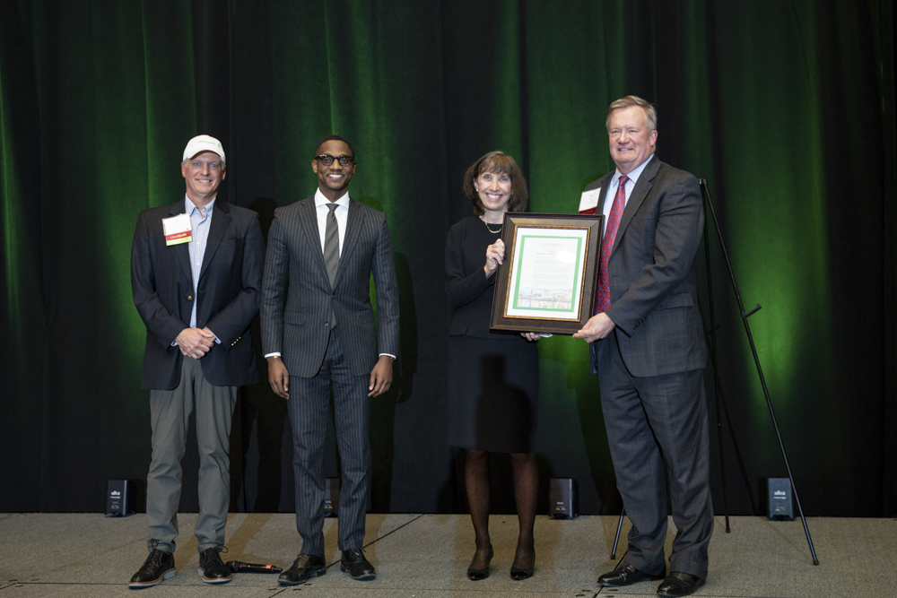Jim Malz, President of Citizens, Ohio, left, Mayor Justin M. Bibb, CLC President & CEO Marianne Crosley, and CLC Board Chair Bill Caster, President of Gries Financial Partners