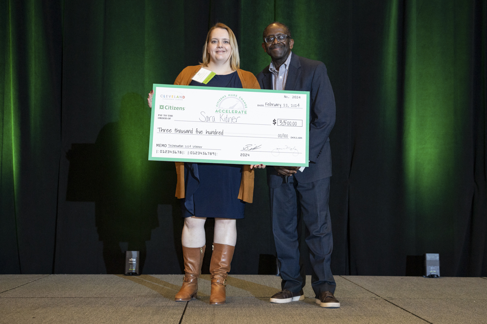 Technovation winner Sara Kidner, left, with Leon Wilson of category sponsor Cleveland Foundation