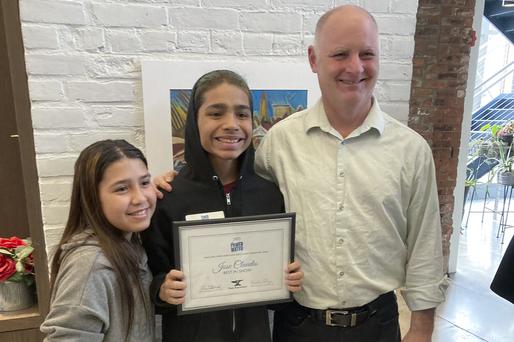 EMSD director with student artist Jose Claudio - Best in Show winner