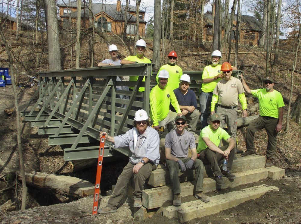 Workers posing on the Old Carriage Bridge