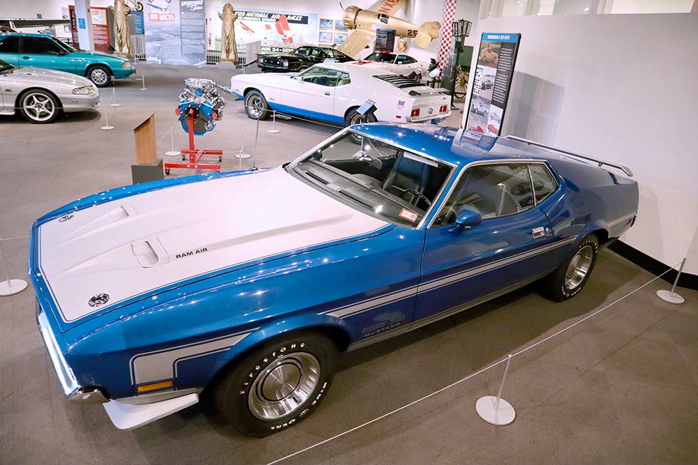 The blue 1971 Mustang Boss 351 and the white 1972 Mustang Sportsroof both feature a 351 cubic inch engine that was built at the Brook Park, OH, Ford plant, and thus was called the 351 Cleveland.
