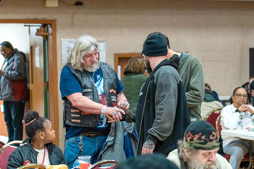 Steak Club Foundation serves meals at Middlebury Chapel in Akron