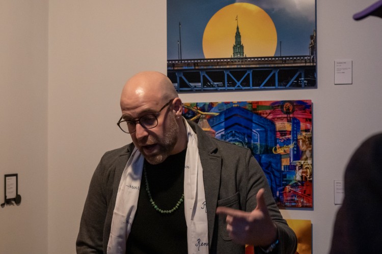 Jason Toth in front of "The Beaten Path is Defeated."