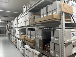 Library lower level newly installed collection storage units and lighting.