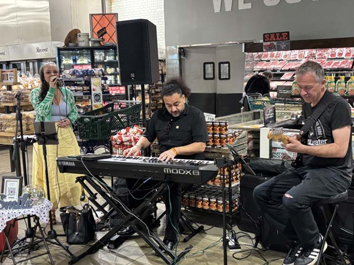 The Sara Smile Trio performs at Dave's Market during a Roots of American Music performnace.