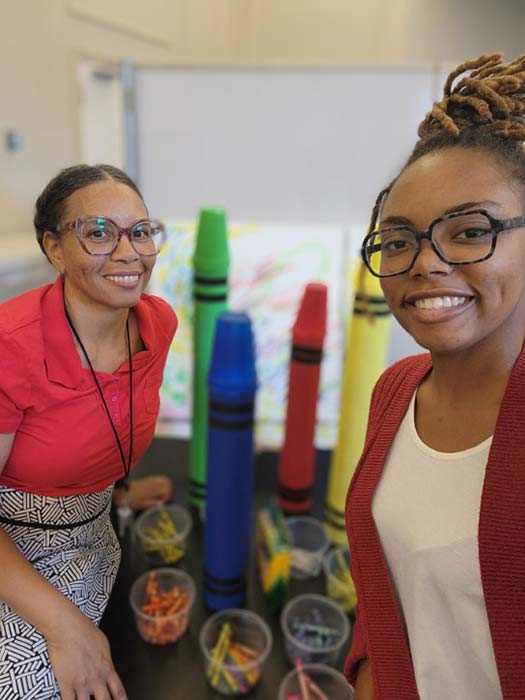 Mother-daughter duo Stephanie Stewart, left, and Kyla Decatur are contributing giant cardboard crayons to RTL 2025.