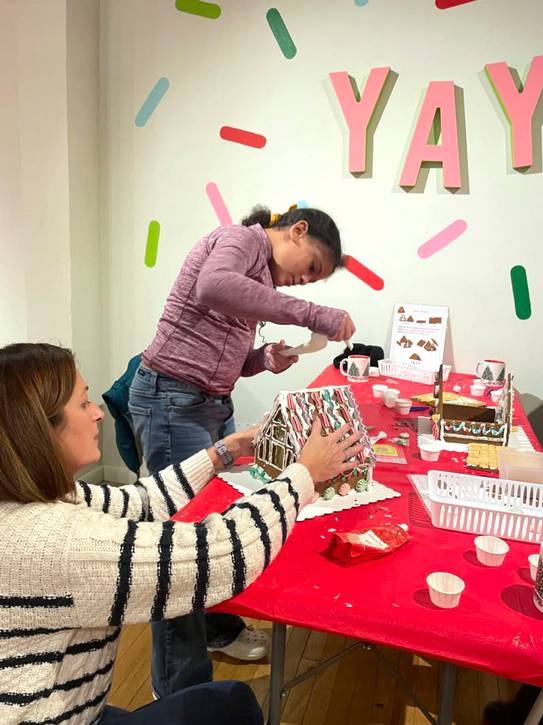 Guests work on their decorations at The Jolly Gingerbread Makery Pop-Up Workshop.