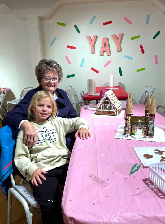 Guests at The Jolly Gingerbread Makery Pop-Up Workshop at 78th Street Studios.