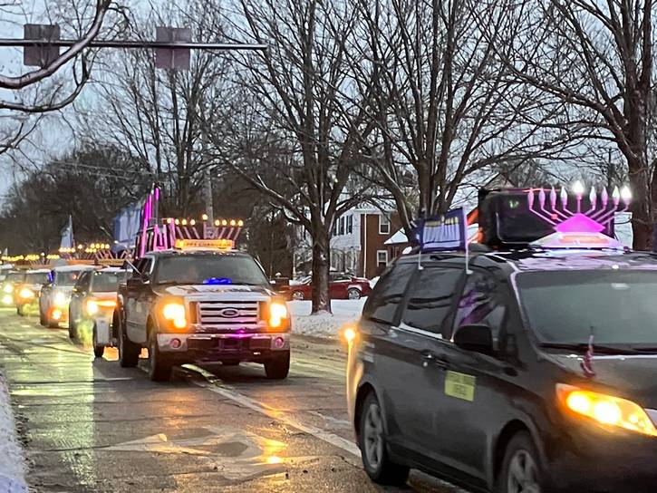 One the first day of Chanukah, Sunday, Dec. 14, the Light After Dark Menorah Parade traveled through the Heights.