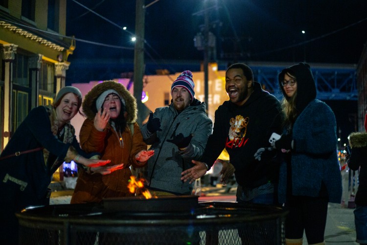 Warming up at the fire pit