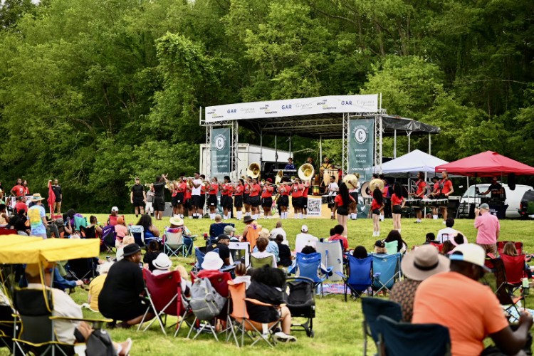 The Shaw High School Marching Band performs at Rhythm on the River