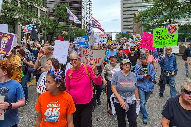 No Kings protestors march through downtown Cleveland