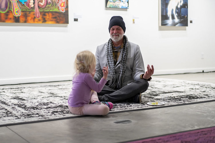 Artist Kristin Rogers has a Zen moment with his companion