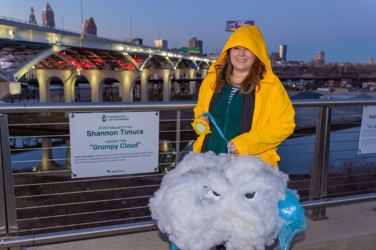 Artist Shannon Timura with “Grumpy Cloud"