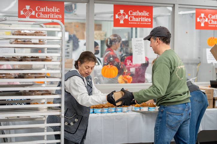 Catholic Charities volunteers prepare for Thanksiving.