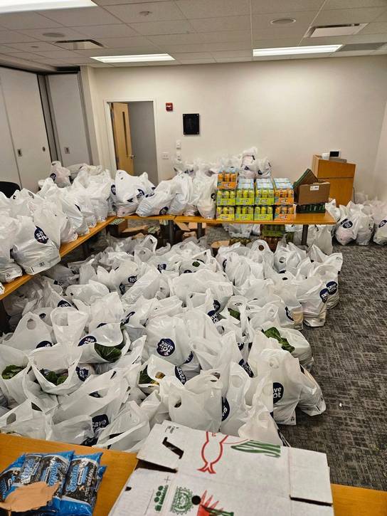 The bags of turkeys ready for pick up are Care Alliance Health Center.