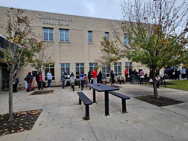 Residents waiting to pick up their turkeys in 2024 at Care Alliance Health Care facility in the Central neighborhood.