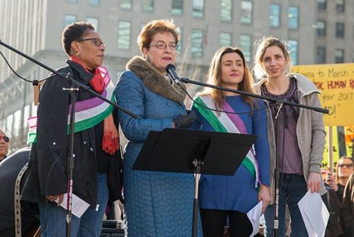Marcia Fudge, left, and Marcy Kaptur with Case Western Reserve graduate students Claudia Pasma and Laura Seagraves, who organized the 2017 International Women's March.