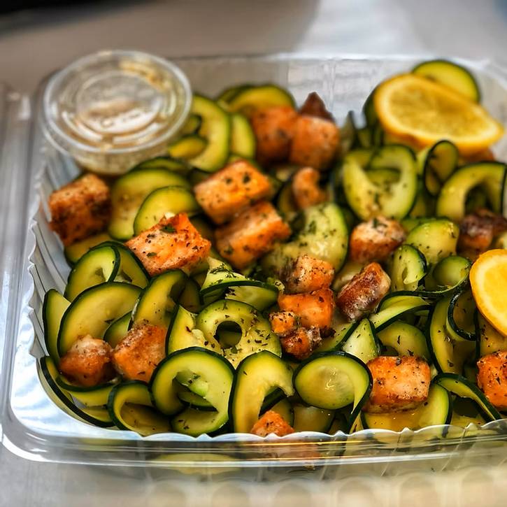 Garlic butter salmon bites with zoodles, made by Chef Tyisha, founder of Food with Purpose.