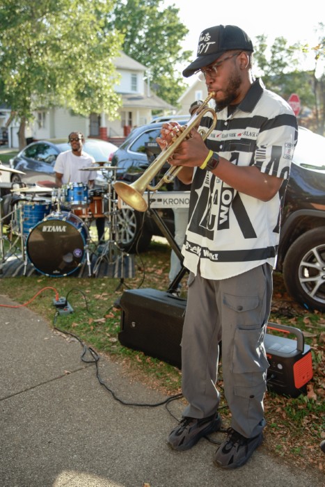 Horn player Frank Walton helped get the Canopy high-speed internet party started at the Cashdollar home.